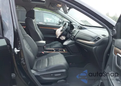 2021 Honda Cr-V Hybrid Touring z USA, uszkodzony, nr VIN 7FART6H96ME001993